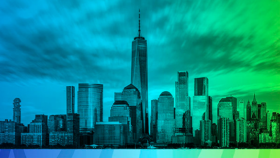 Greenish blue view of the city with tall buildings