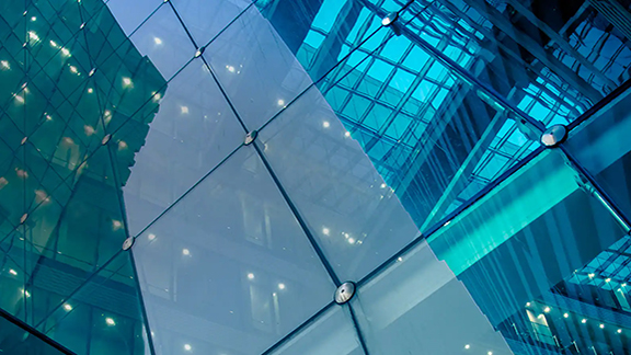 Close-up of a modern building with a glass facade