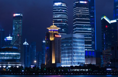 Cityscape at night across river